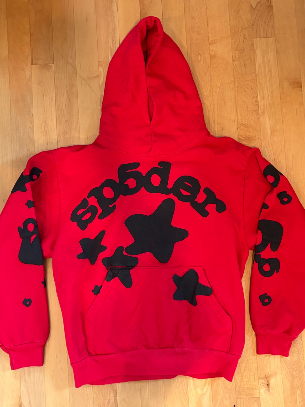 Sp5der Red Graphic Hoodie with Black Star Design